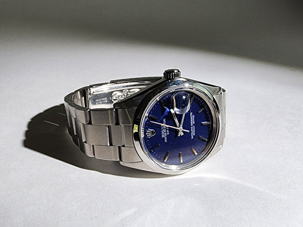 Custom Vintage Rolex Date with a custom Midnight Blue dial and an original stainless steel band